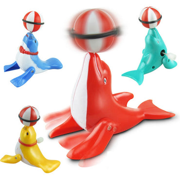 1pcs Children Boys Gifts Classic Toys Color Randomly Kids Wind Up Clockwork Toy Cartoon Dolphins Ball Educational Toys